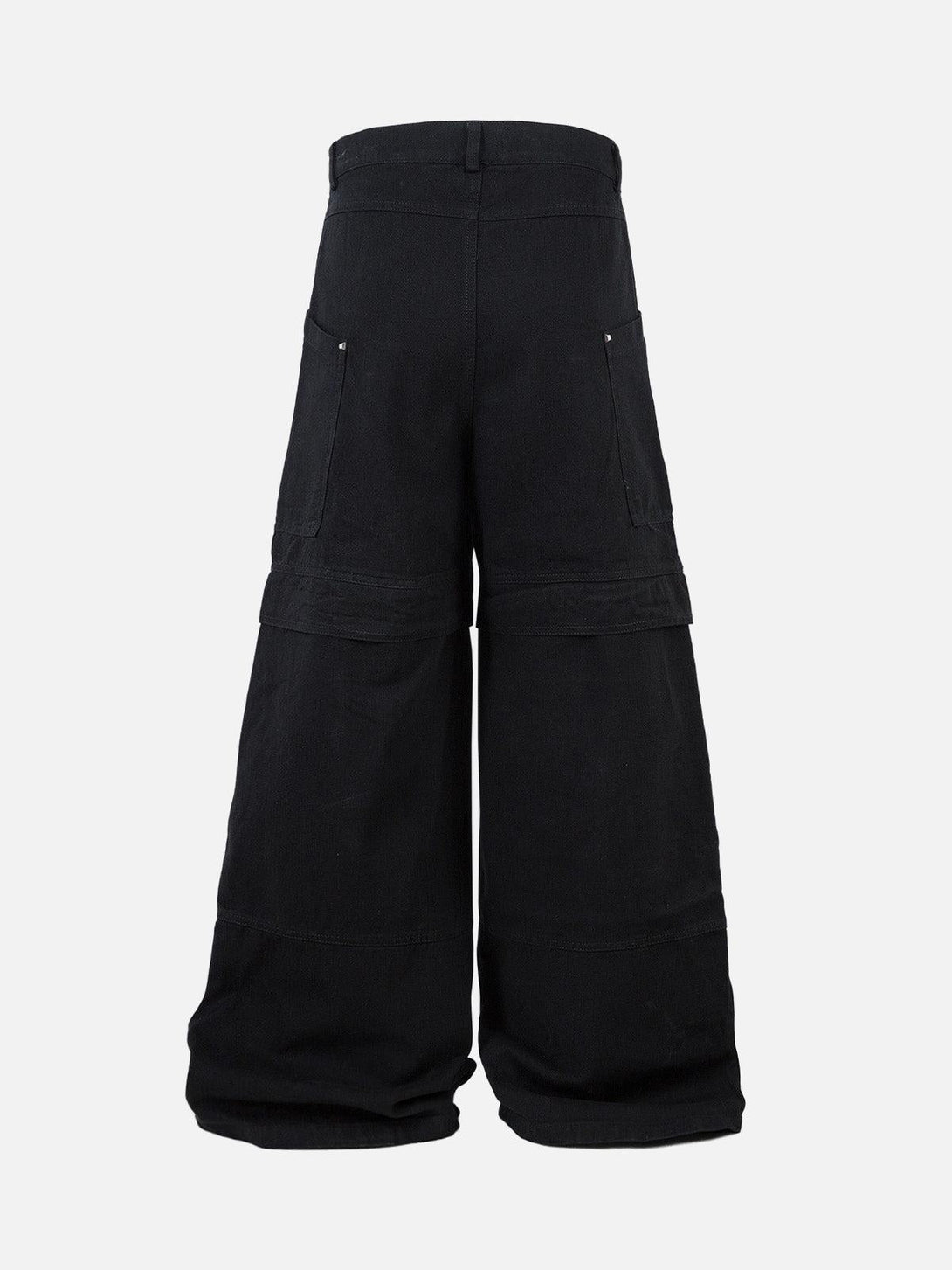 Back view of black deconstructed cargo jeans by TALISHKO, highlighting wide-leg silhouette.