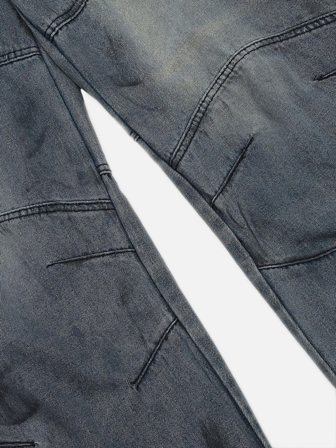 Detailed fabric and stitching of TALISHKO's deconstructive design washed jeans, highlighting unique craftsmanship.