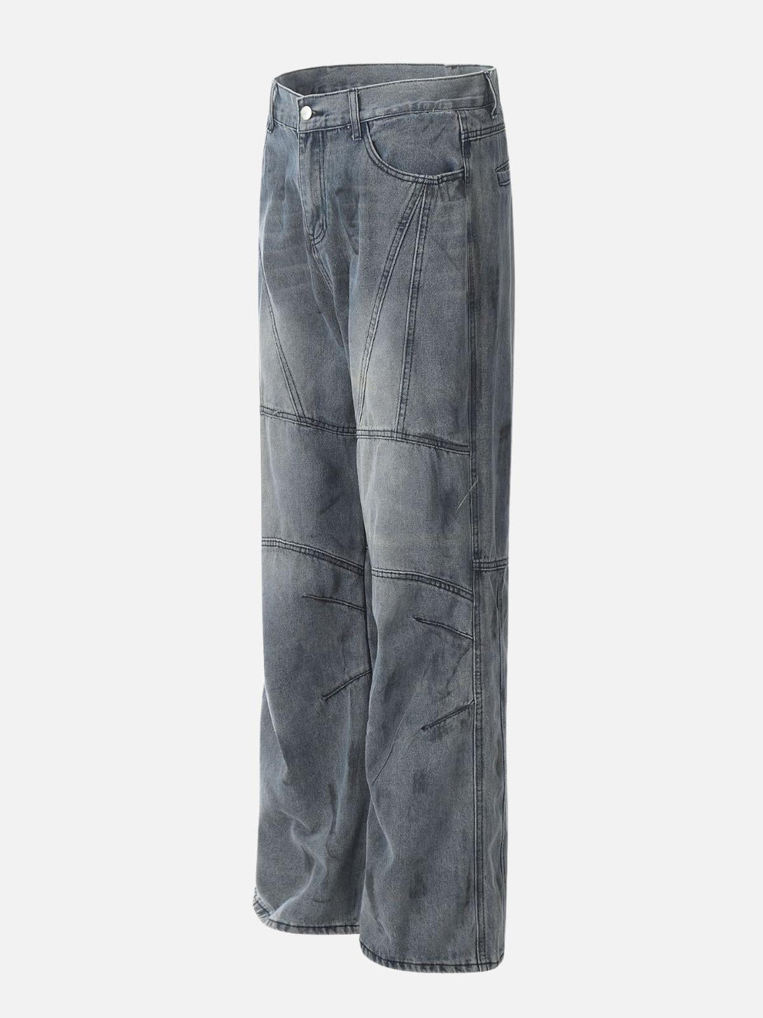 Side view of deconstructive design washed jeans by TALISHKO, showcasing unique stitching.