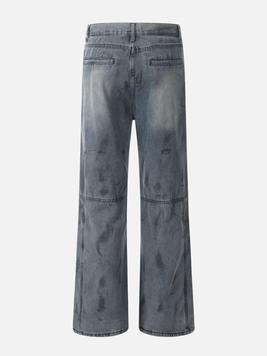 Back view of deconstructive design washed jeans by TALISHKO, featuring a relaxed fit.