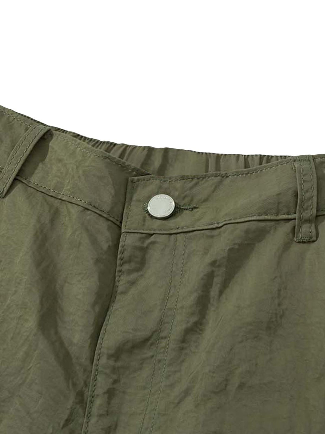 Close-up of TALISHKO work pants waist, highlighting olive fabric and button detail.