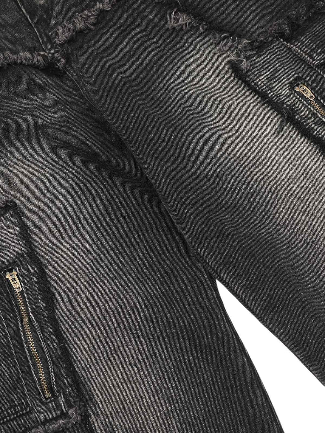 Detailed fabric and stitching of TALISHKO distressed cargo jeans, showcasing raw edges and zippers.