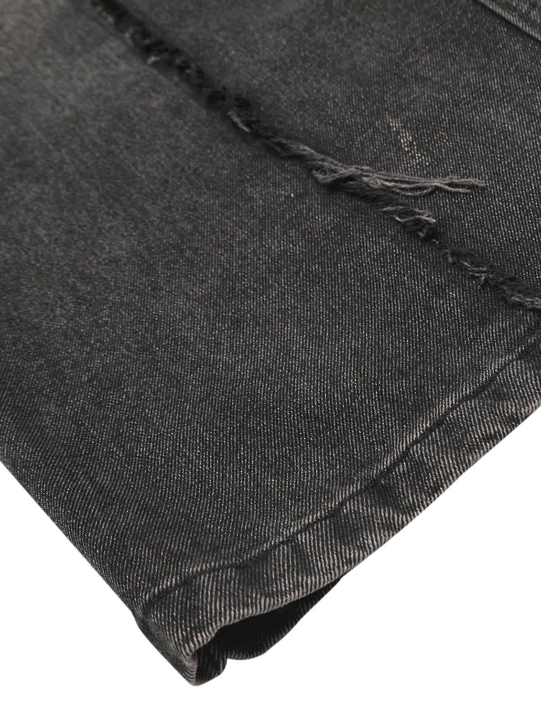 Detailed fabric and raw edge style of TALISHKO cargo jeans, emphasizing distressed texture.