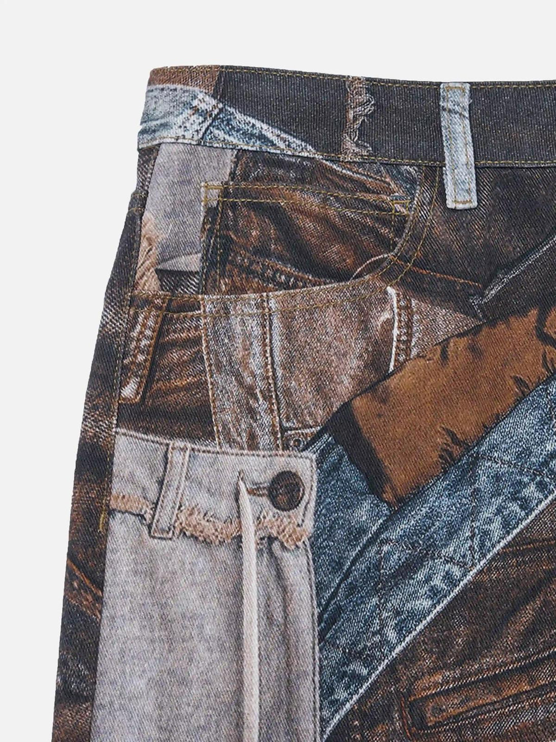 Intricate patchwork design on TALISHKO faux panel jeans, showcasing detailed stitching.