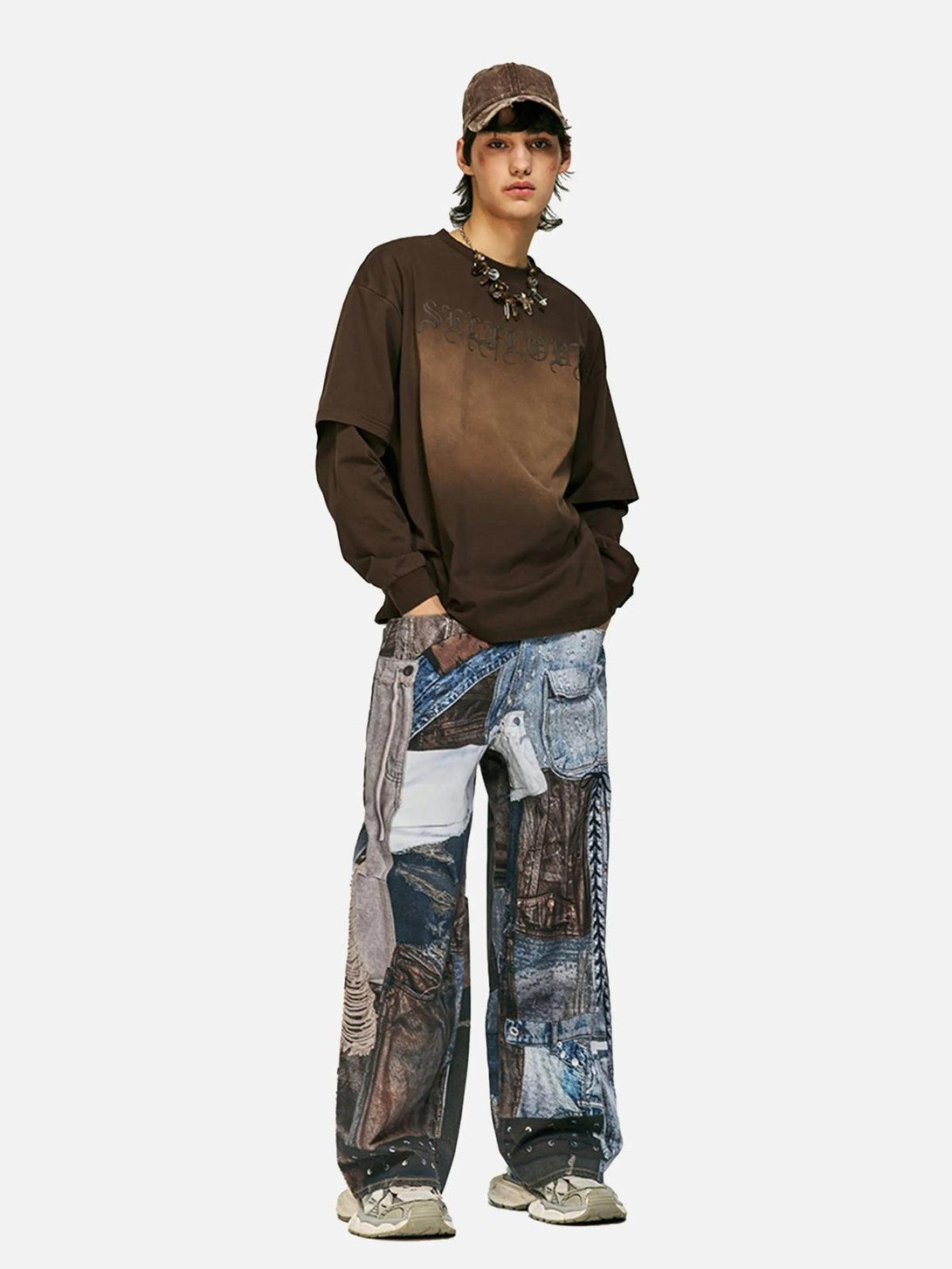 Model wearing TALISHKO digital printed faux panel jeans with a brown top and cap.