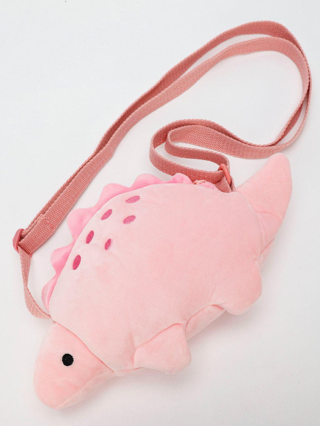 Adorable pink dinosaur crossbody bag by TALISHKO with playful design and adjustable strap.