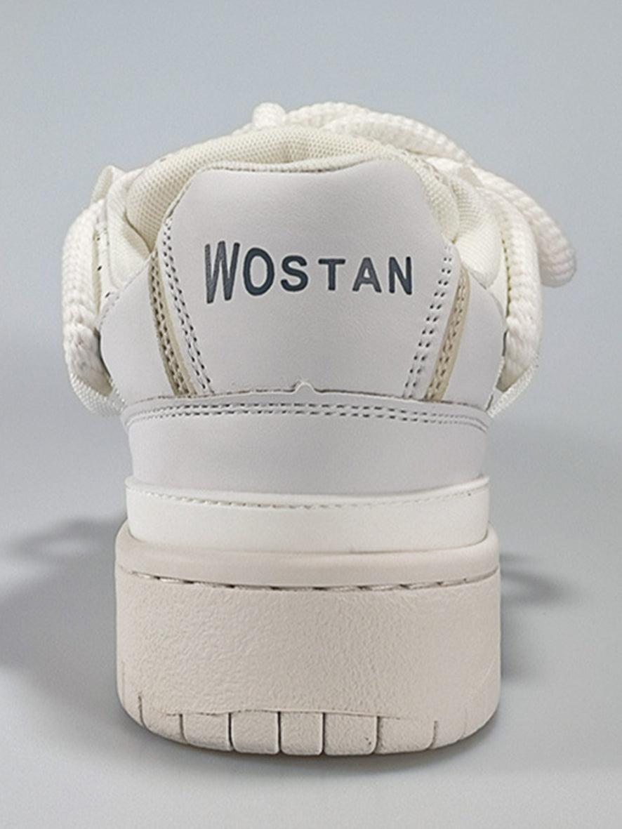 Back view of white skateboard shoes by TALISHKO, showcasing the unique braided design.