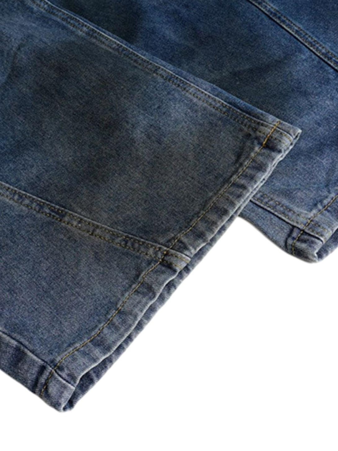 Detailed fabric and stitching of TALISHKO Dirty Dye Baggy Barrel Jeans, highlighting texture.
