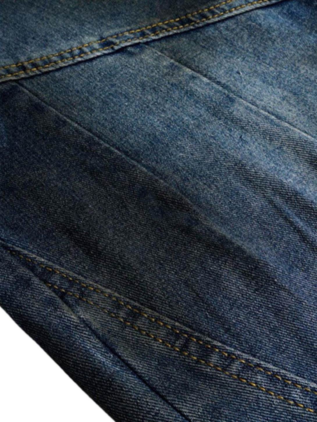 Intricate look at TALISHKO denim, showcasing texture and stitching on baggy barrel jeans.
