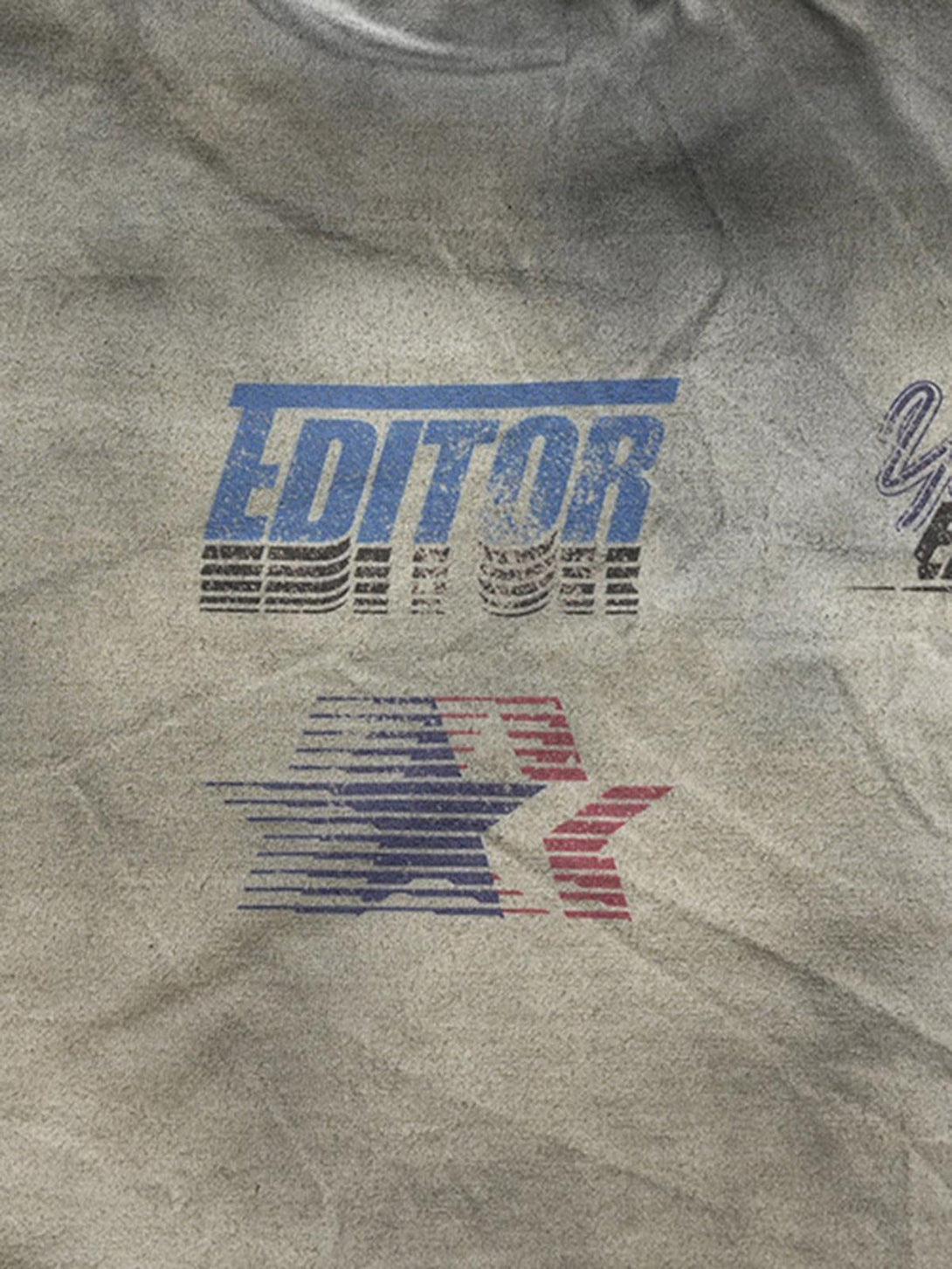 A detailed look at the TALISHKO street rap T-shirt's bold graphics on a dirty wash fabric.
