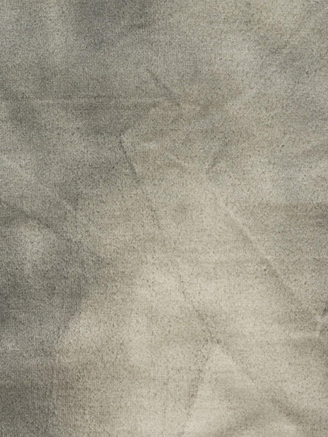 "Zoomed-in texture of TALISHKO T-shirt fabric, highlighting the dirty wash effect."