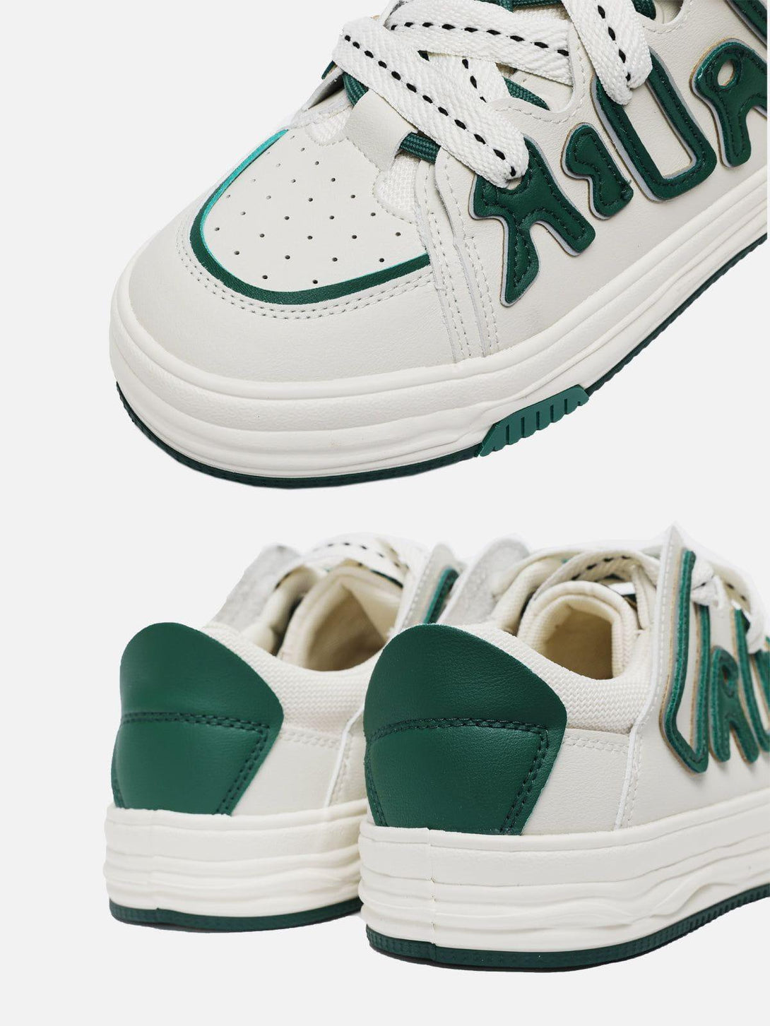 Close-up of TALISHKO skate shoes with green detailing and unique patchwork design.