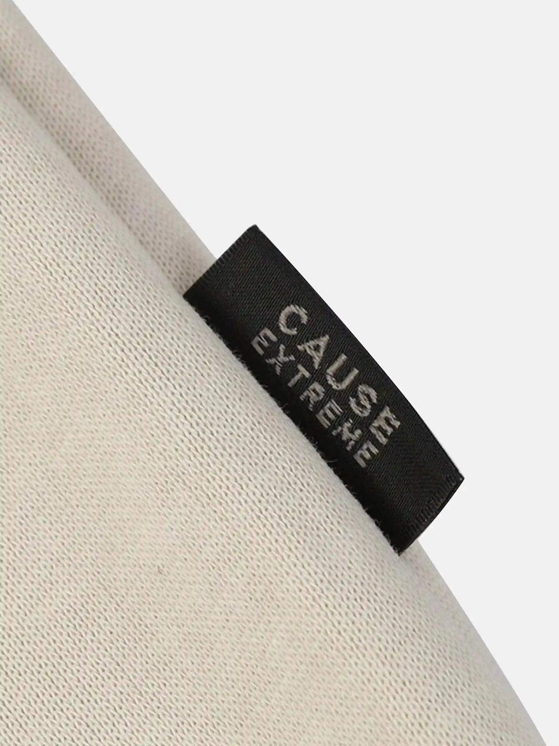 A close-up of TALISHKO hoodie fabric with brand tag, highlighting texture and quality.