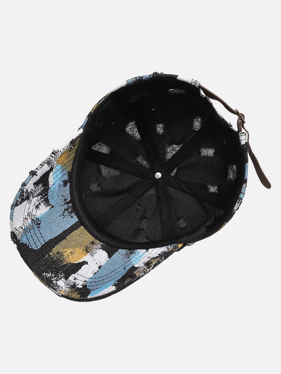 A detailed view of TALISHKO's distressed abstract print baseball cap, highlighting its artistic design.