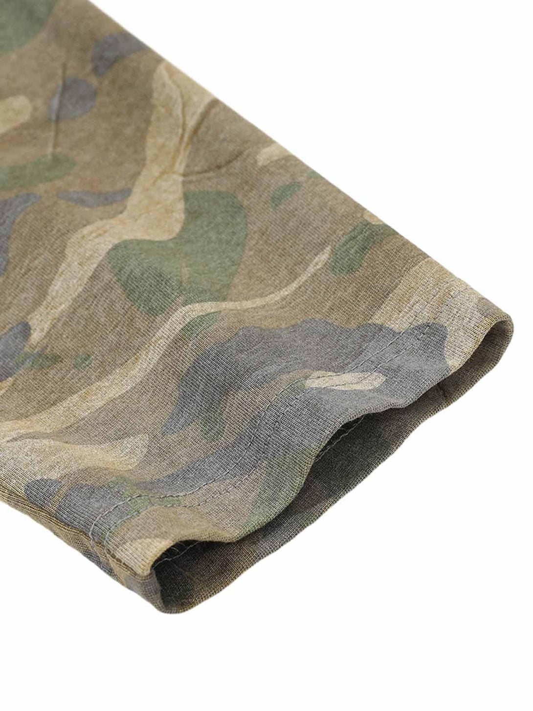 Intricate look at TALISHKO camouflage sleeve, highlighting the distressed fabric's texture.