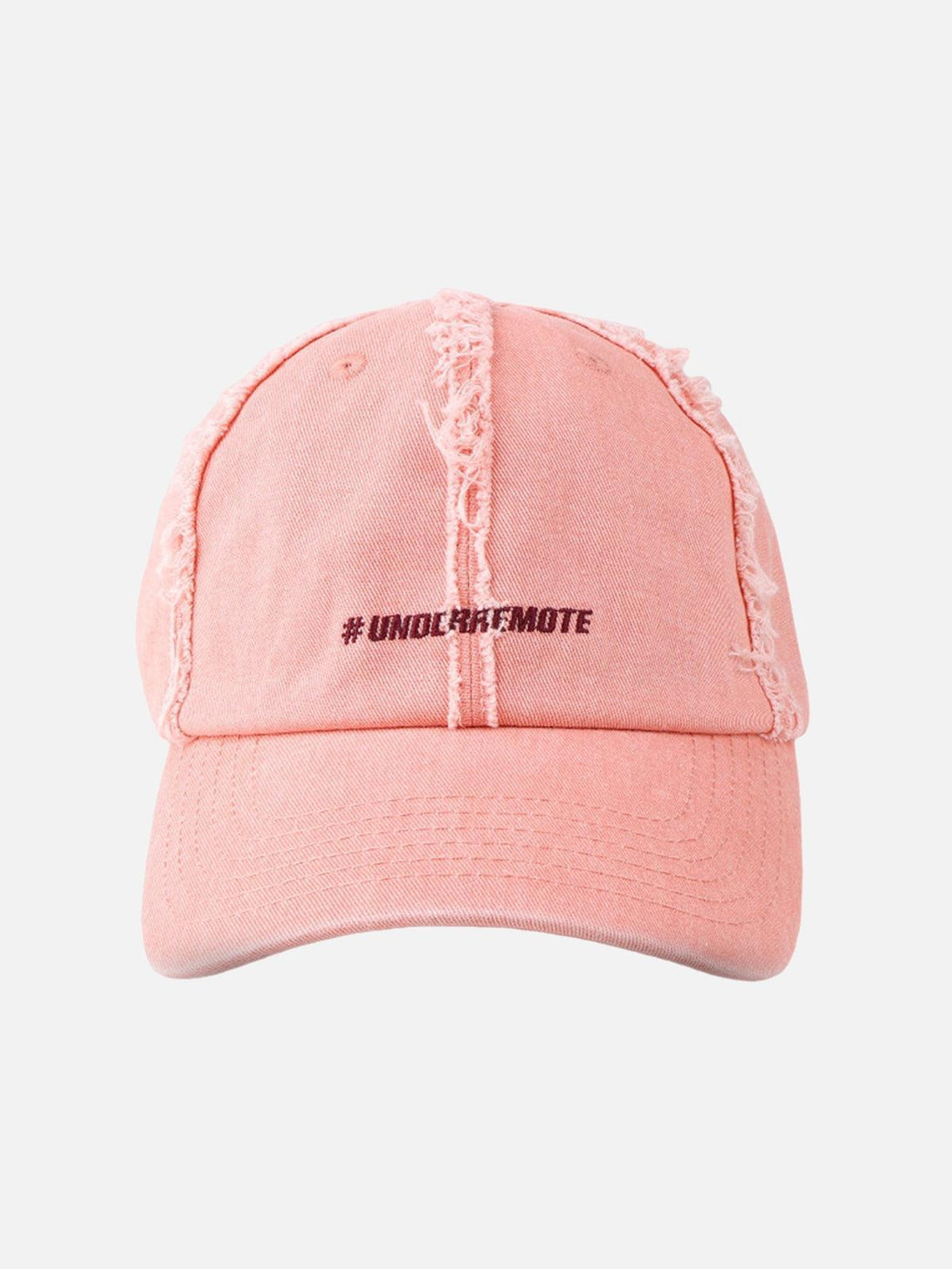 Front view of a pink distressed denim baseball cap by TALISHKO, featuring bold embroidery.