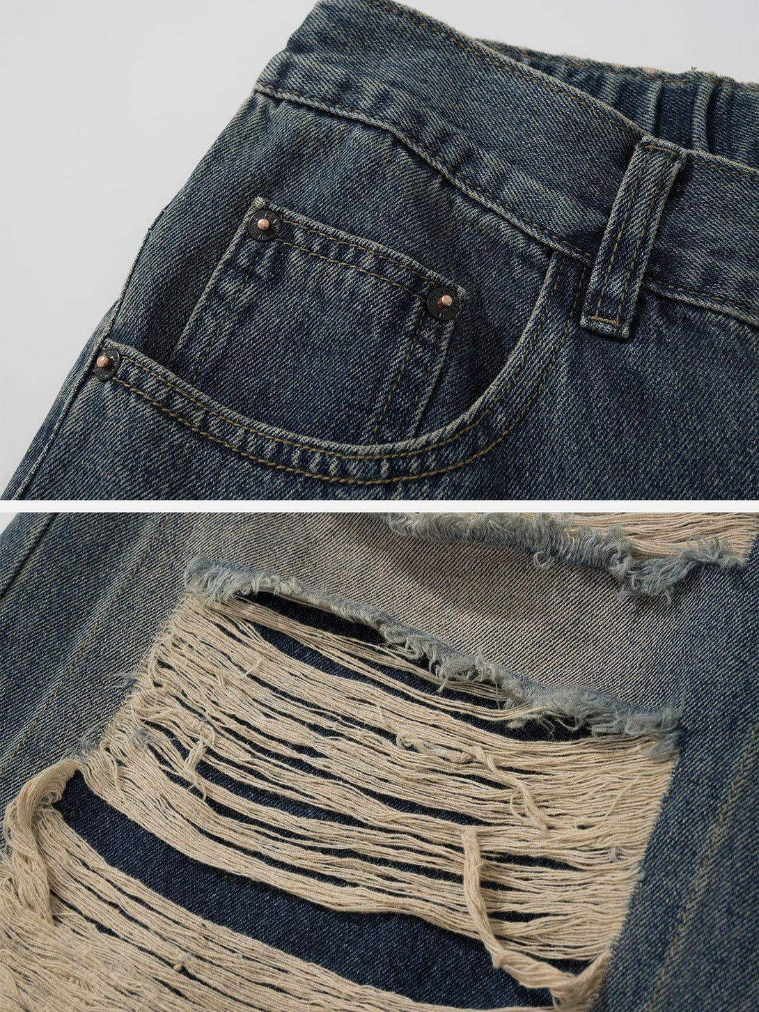 Detailed view of TALISHKO's distressed loose jeans, highlighting intricate ripped design.