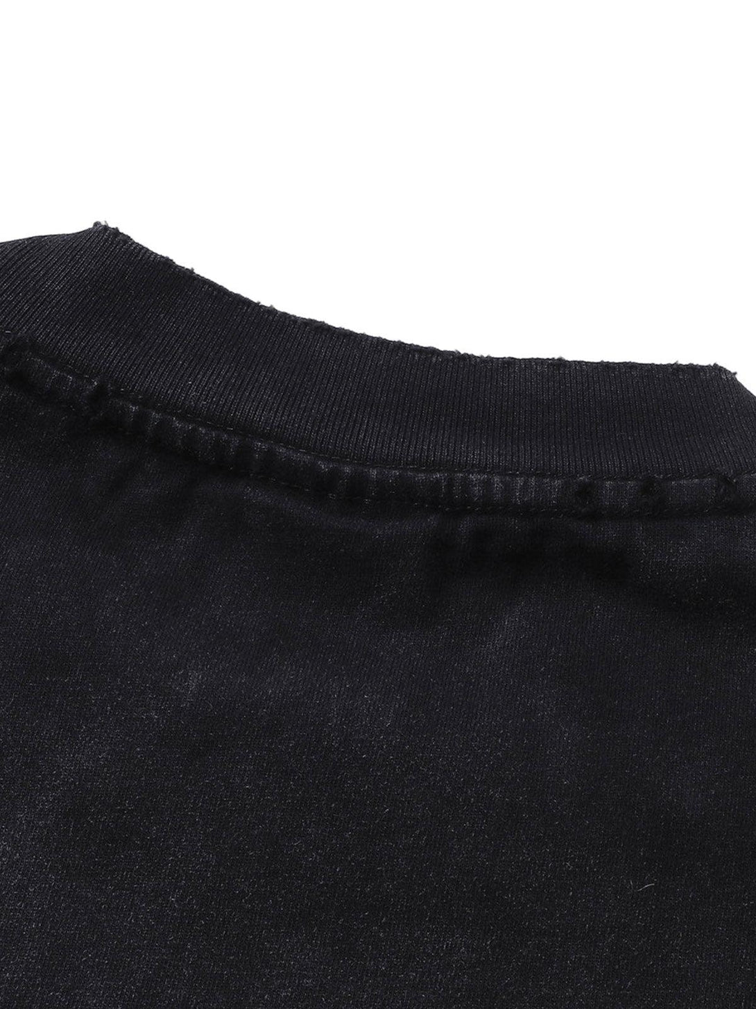 A close-up of the collar on the black distressed T-shirt by TALISHKO, highlighting its texture.