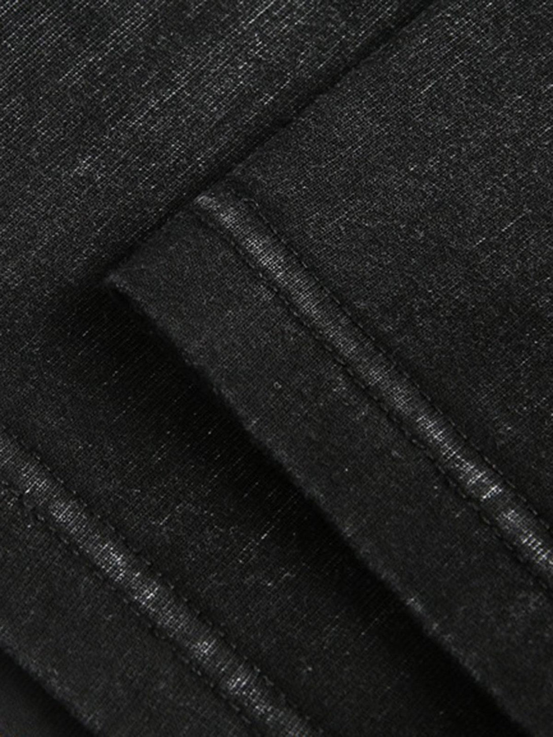 Detailed fabric and stitching on a TALISHKO T-shirt, highlighting its unique texture.