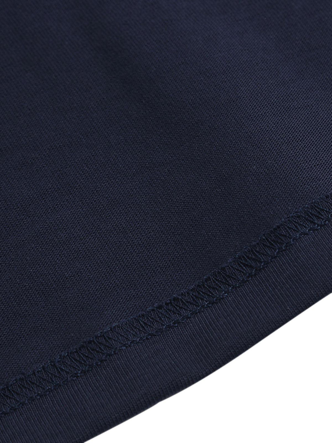 Detailed fabric and stitching on a navy TALISHKO crew neck T-shirt, highlighting quality craftsmanship.