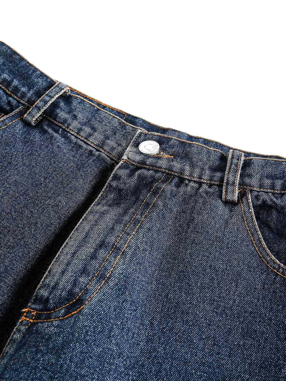 A detailed view of TALISHKO straight jeans, showcasing the rich denim texture and stitching.
