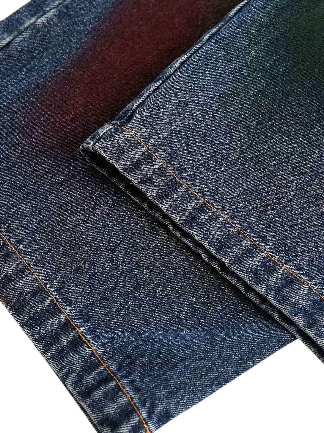 Detailed fabric and stitching of TALISHKO jeans, highlighting denim texture and craftsmanship.