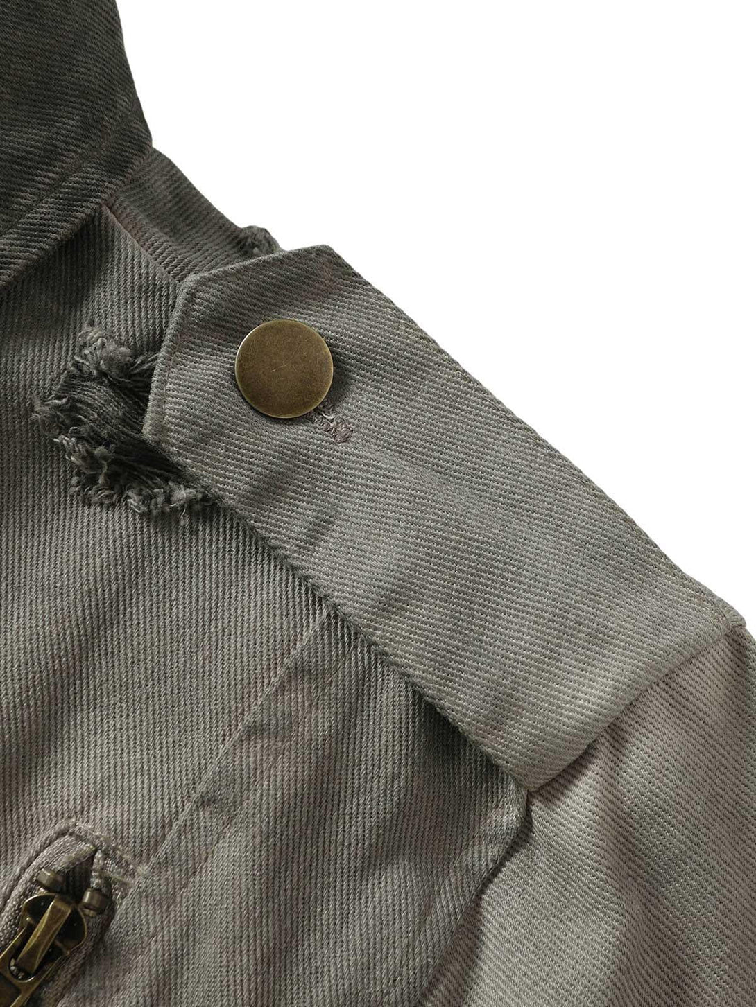 A close-up of TALISHKO denim jacket's shoulder showing distressed fabric and button detail.
