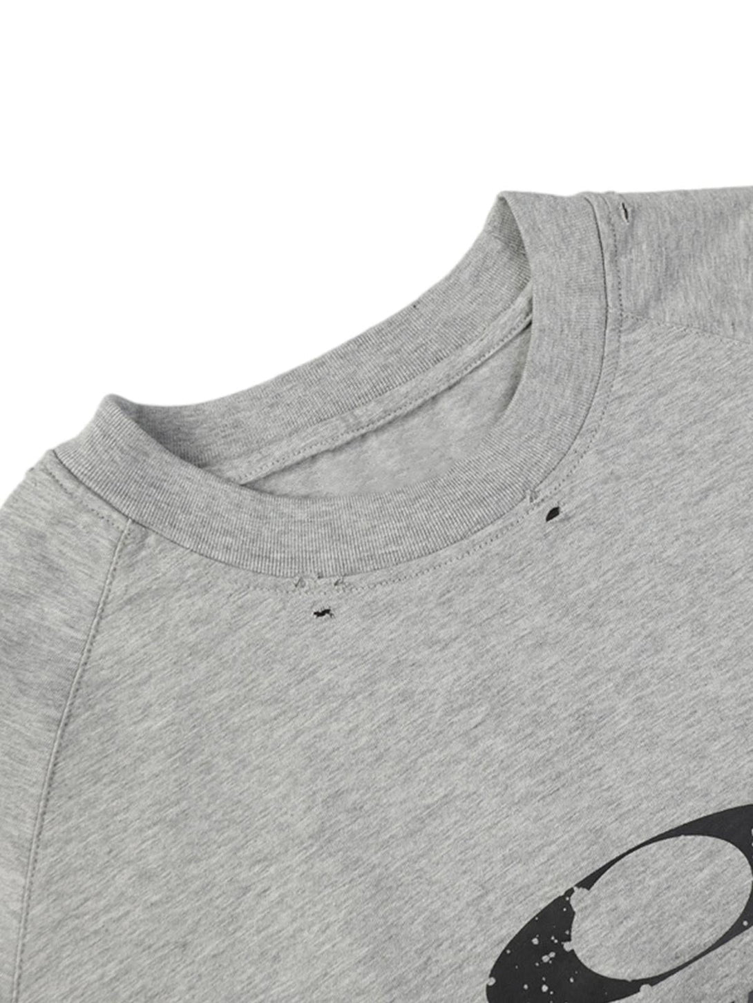 Detailed view of TALISHKO's gray distressed long-sleeved T-shirt, highlighting neckline texture.
