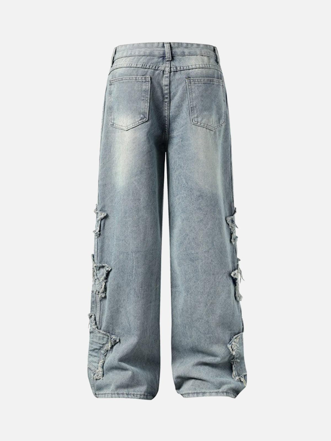 Back view of distressed baggy jeans by TALISHKO, featuring raw edges and a relaxed fit.