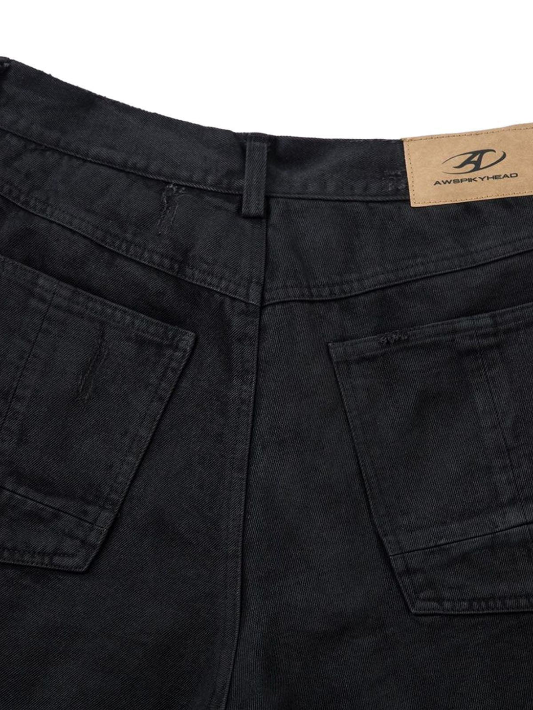 Back view of TALISHKO black denim shorts highlighting patch pockets and sleek design.