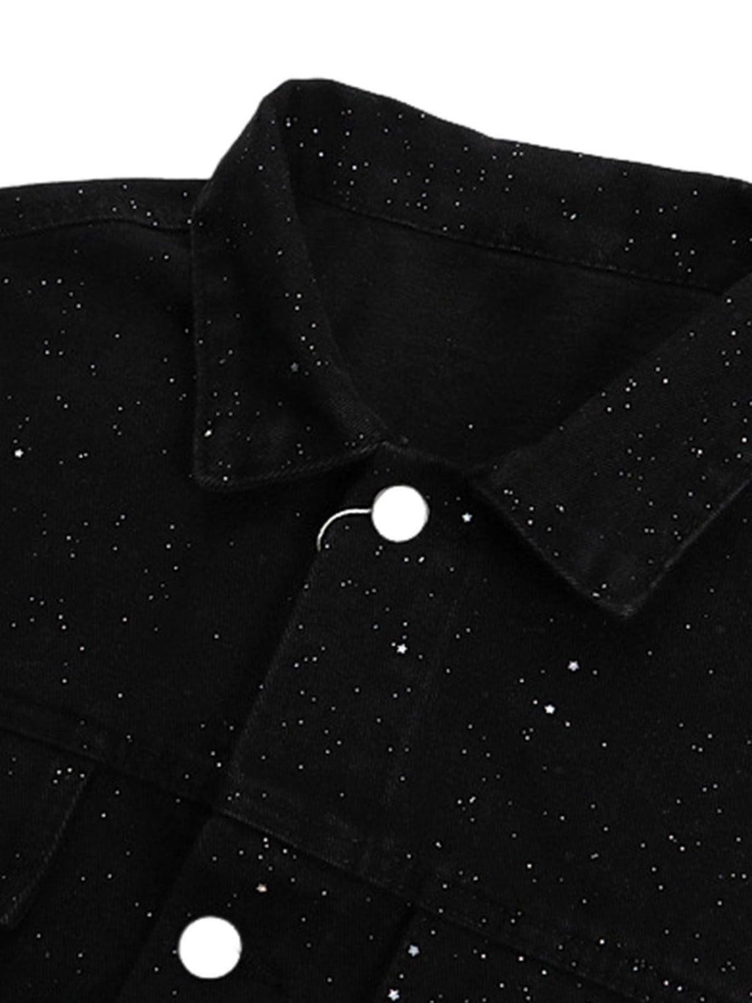 A close-up of TALISHKO's black denim jacket, highlighting the starry sequin design.