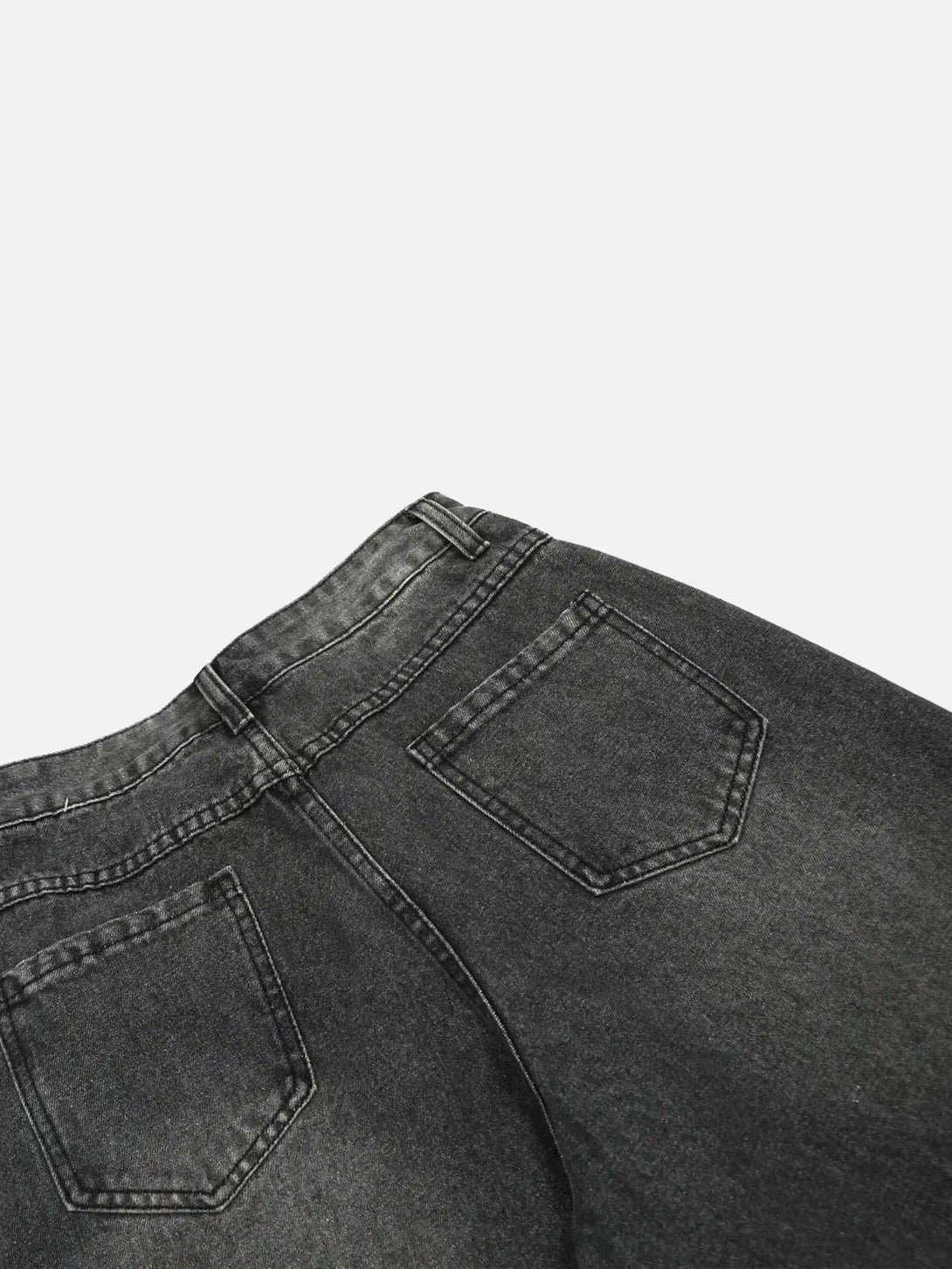 Back view of TALISHKO distressed jeans, showcasing unique pocket design and rugged style.