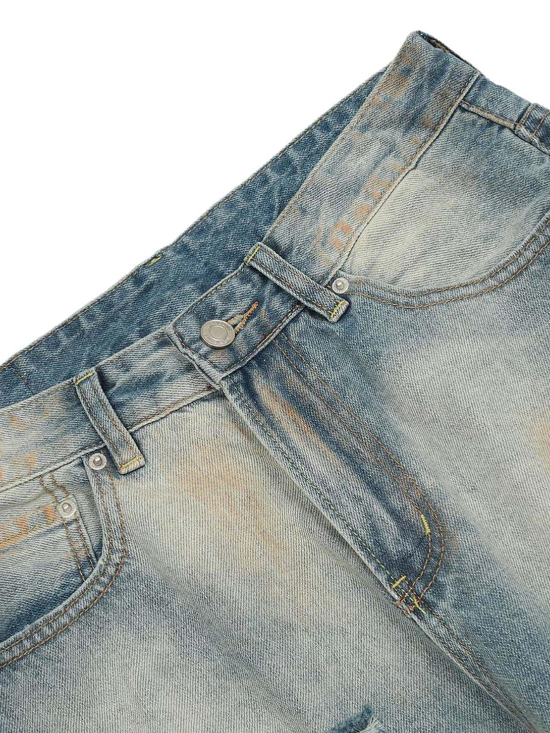 Intricate look at TALISHKO's distressed hip-hop jeans, highlighting unique wash and texture.