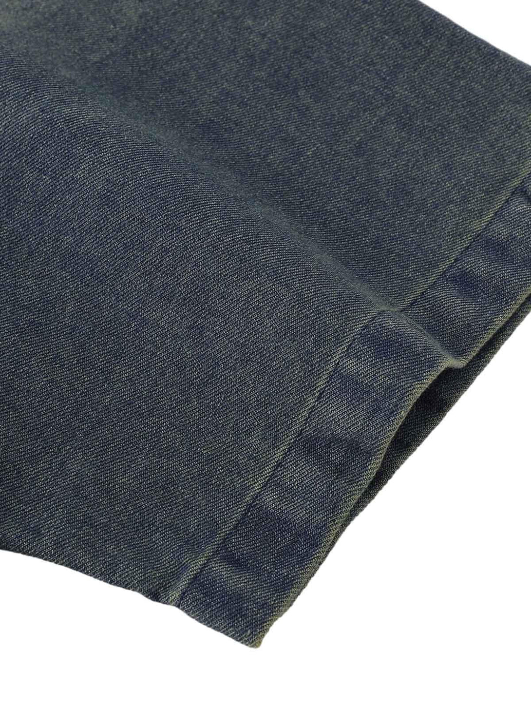 A detailed look at the washed denim texture on a TALISHKO gradient T-shirt.