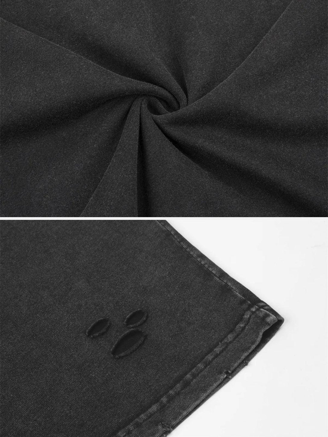 Detailed look at TALISHKO's distressed washed tee, showcasing its unique ripped texture.