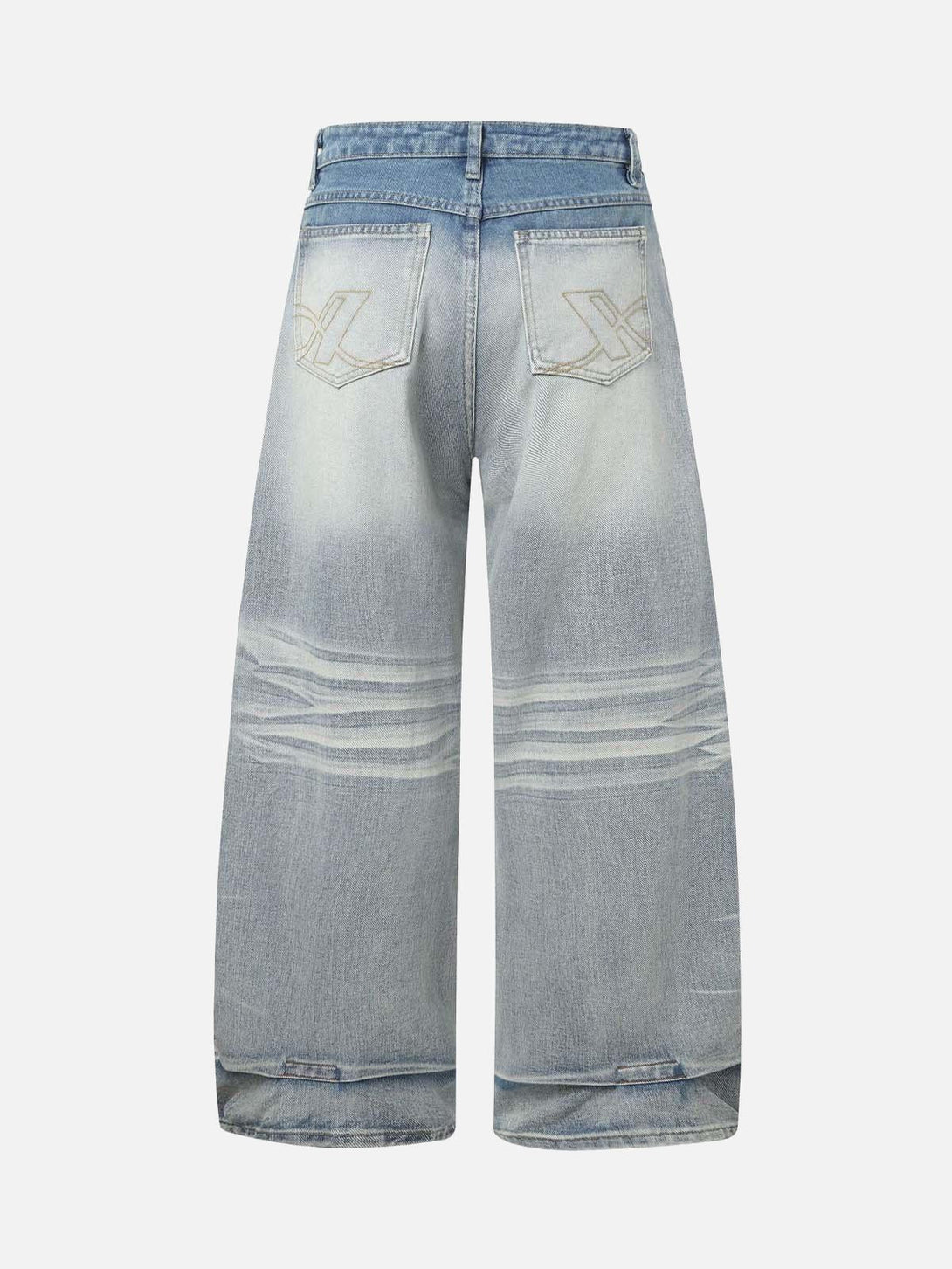 Back view of TALISHKO's washed barrel jeans, showcasing distressed whisker and pleated design.