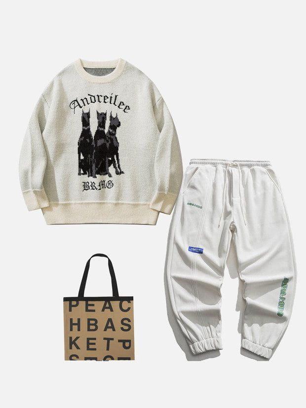 Casual streetwear set featuring TALISHKO Doberman print sweater and joggers, paired with a tote.