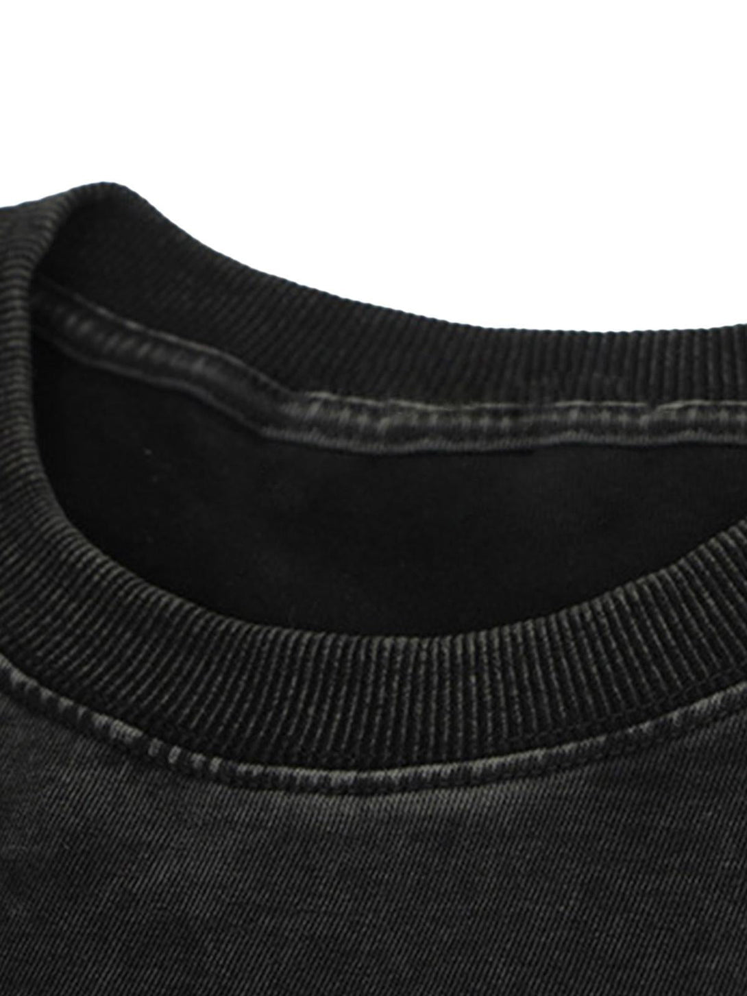 Detailed neckline view of TALISHKO's vintage T-shirt, emphasizing its washed texture.