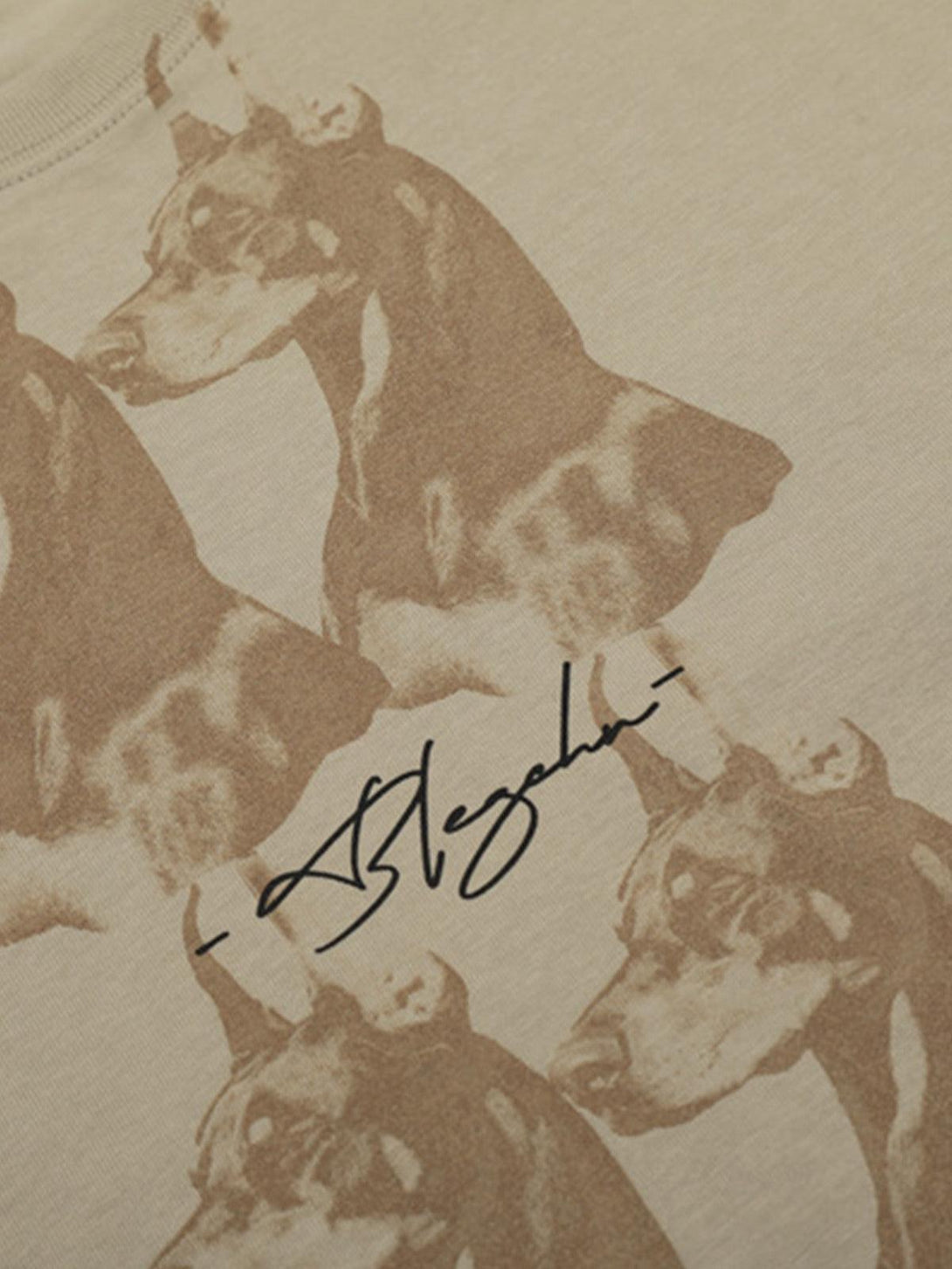 A detailed view of the Dobermann graphic pattern on a T-shirt by TALISHKO, highlighting unique design elements.