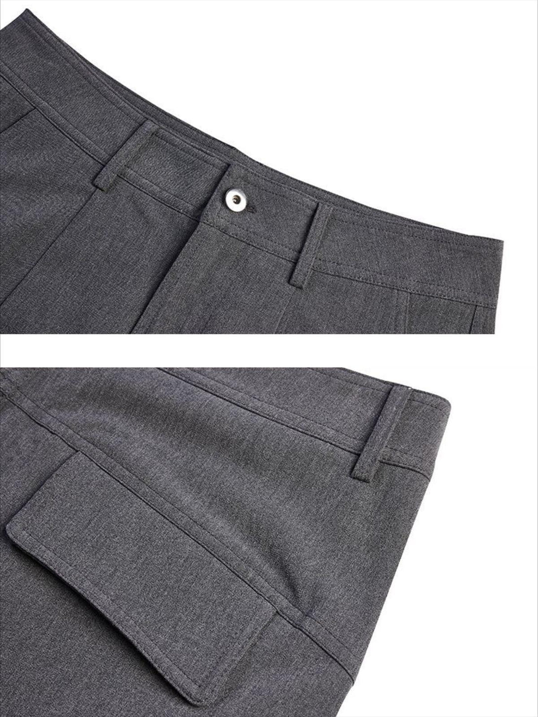 Detailed view of TALISHKO gray drape straight pants, showcasing pocket design and stitching.