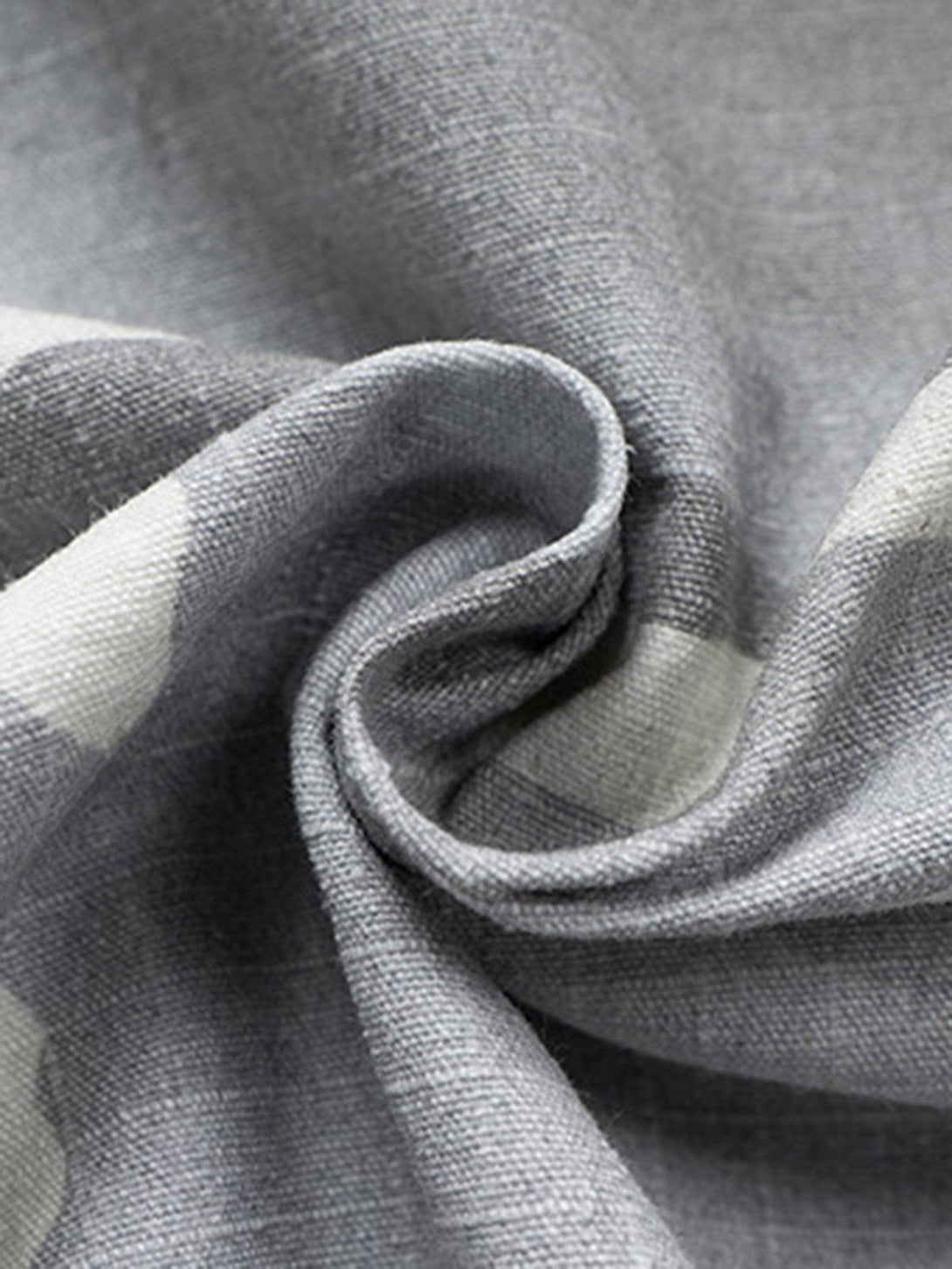 Zoomed-in texture of TALISHKO camouflage fabric, highlighting quality and detailed design.
