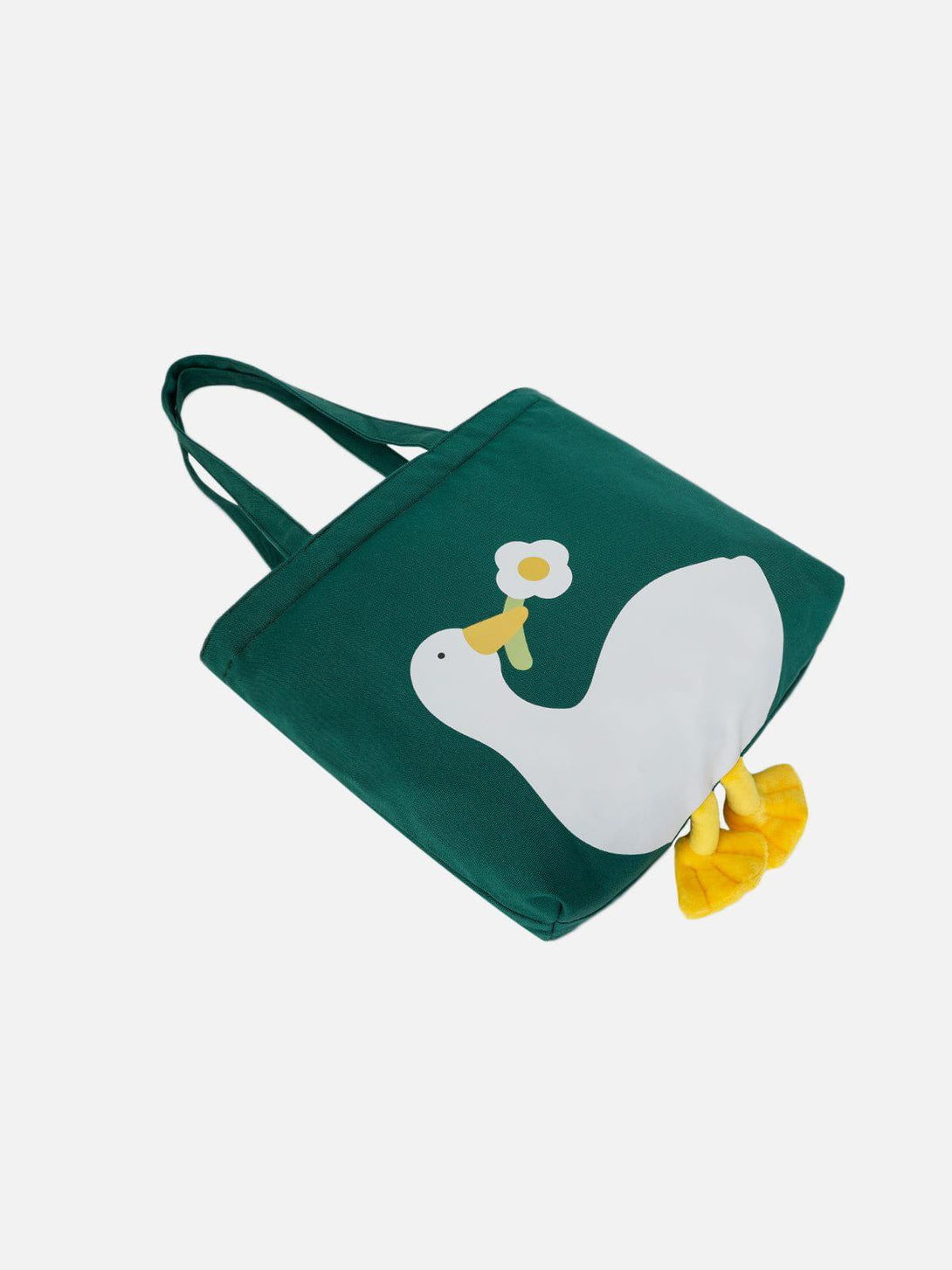 Green canvas bag by TALISHKO with a playful duck and flower design, featuring plush feet.