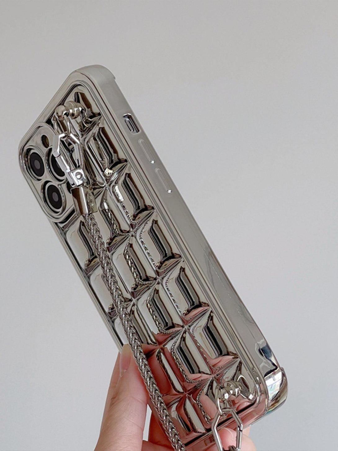 Electroplate block design mobile phone case with heart chain, featuring TALISHKO's unique style.