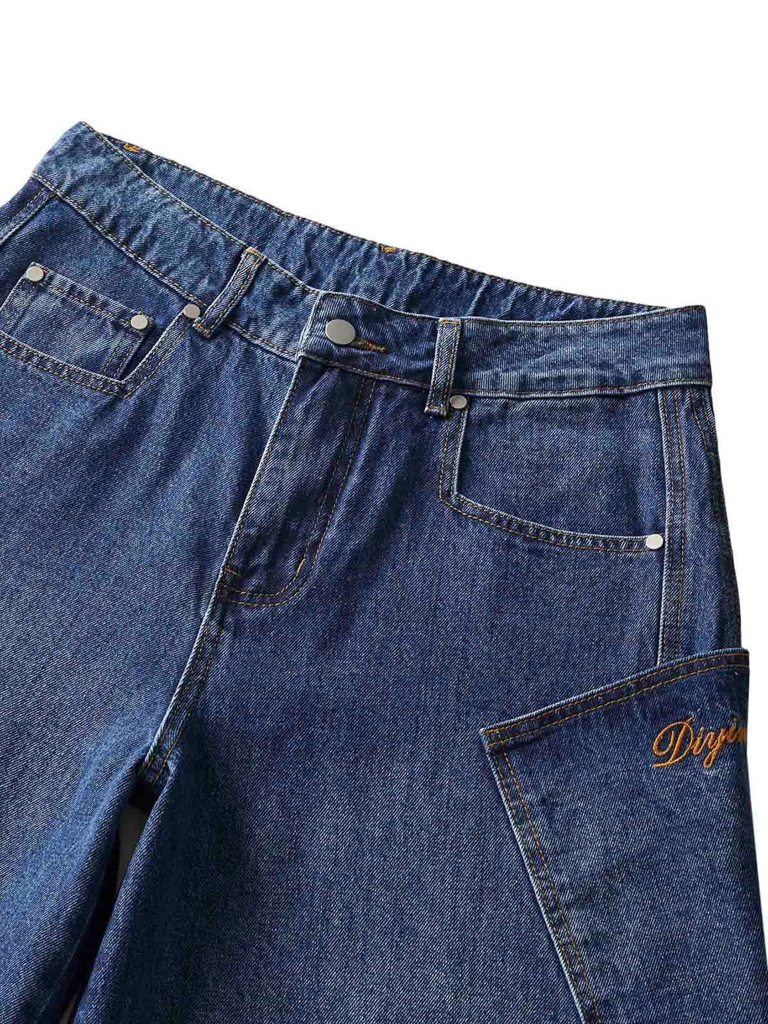 A detailed view of TALISHKO's embroidered barrel leg jeans, highlighting unique pocket stitching.