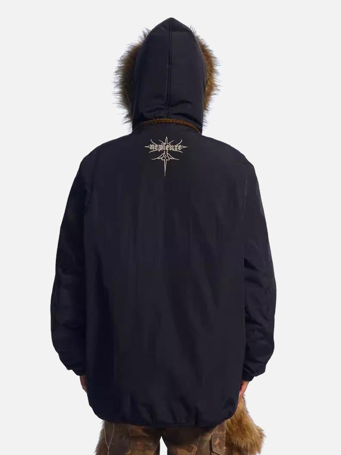 Back view of TALISHKO's quilted jacket with fur-trimmed hood and detailed embroidery.