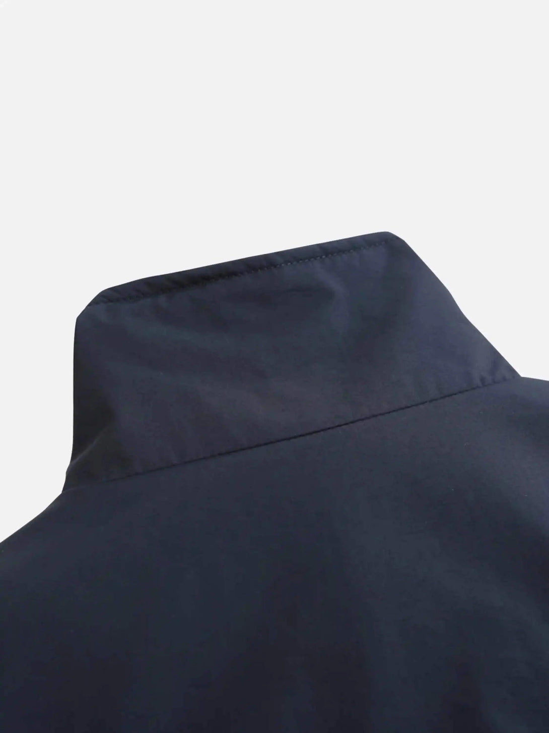 Detailed view of TALISHKO's cotton jacket collar showcasing its sleek design and stitching.