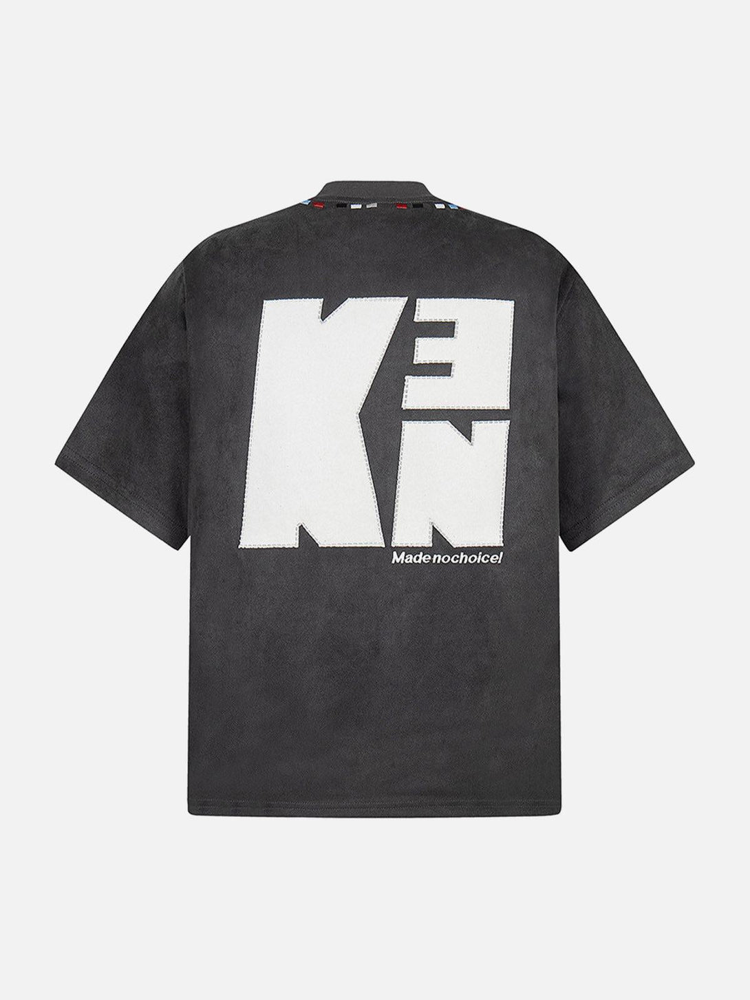 Back view of oversized black T-shirt featuring bold logo and embroidery by TALISHKO.