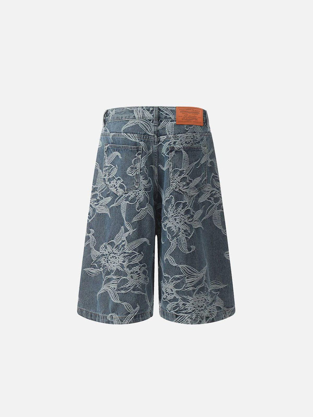 Back view of embroidered flower longline jorts by TALISHKO, showcasing intricate floral patterns.