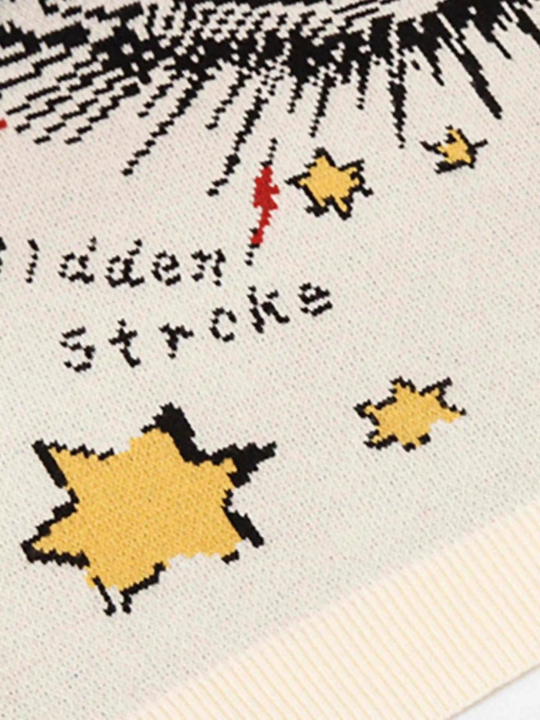 Focusing on the playful star pattern and text detail on the Eye Contact Sweater by TALISHKO.