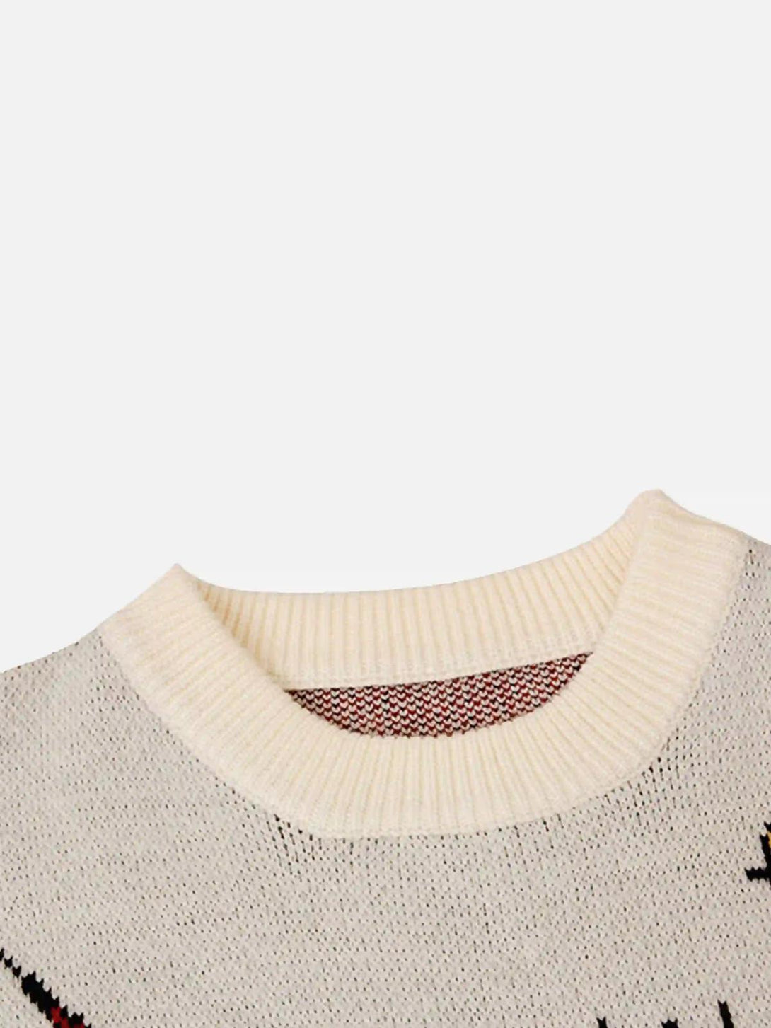 Detailed fabric and stitching of the Eye Contact Sweater by TALISHKO, showcasing its texture.